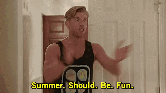 a man in a black tank top is standing in front of a door .