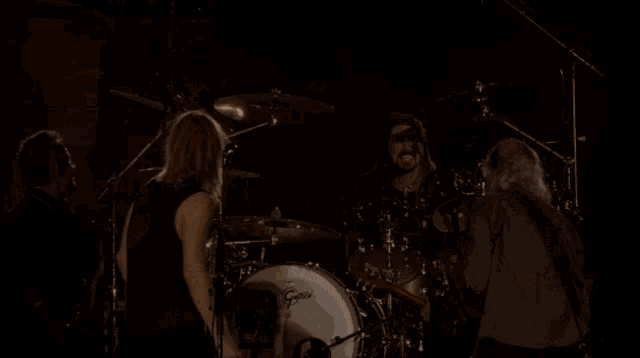 a man playing drums with a drum set that has the word sabian on it