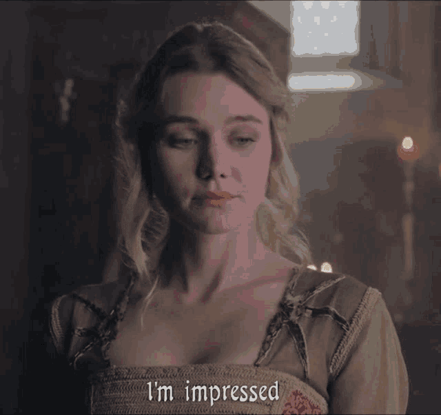 a woman says i 'm impressed while looking at something