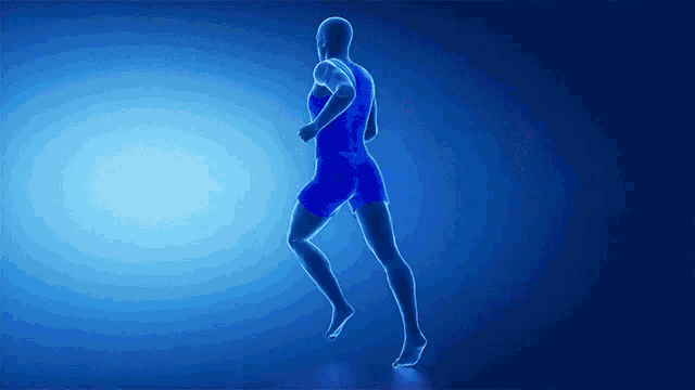 a man in blue shorts is running on a blue background