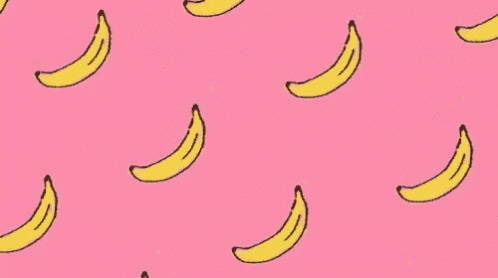 there are many bananas on a pink background .