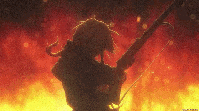 a silhouette of a person holding a rifle in front of a fire background