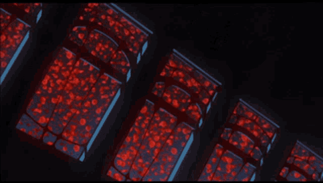 a dark room with a lot of red lights on