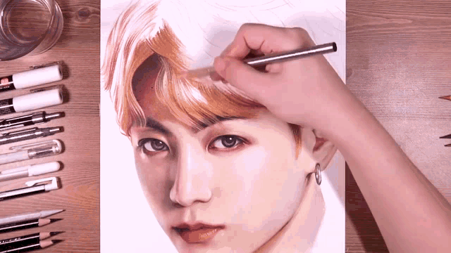 a person is drawing a portrait of a young man with a pencil that says ' sketch ' on it