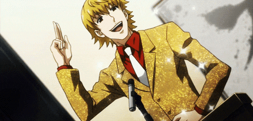 a man in a gold suit is giving a speech at a podium