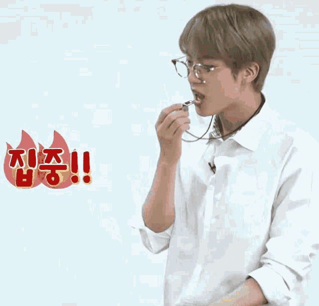 a man wearing glasses and a white shirt has a sticker that says ' i 'm hungry ' on it