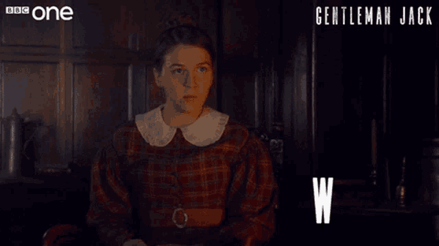 a poster for gentleman jack with a woman in a plaid dress