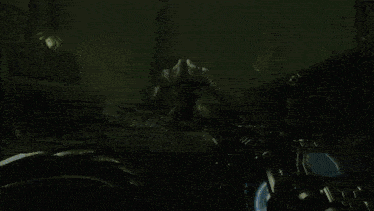 a video game is being played and a green monster is being killed