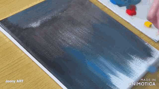 a painting that was made in animatica is laying on a table