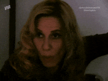 a woman with her mouth open and the words viva on the bottom