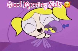 bubbles from the powerpuff girls is sleeping in a purple blanket