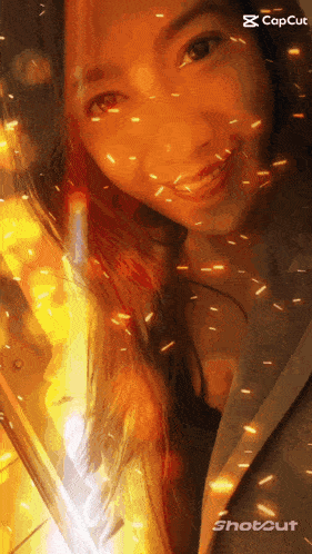 a close up of a woman 's face with a shotcut logo