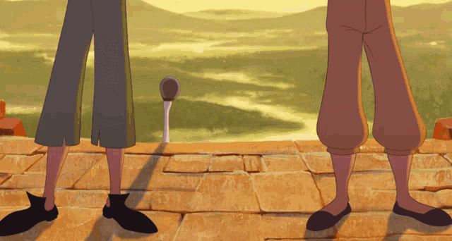 two cartoon characters are standing next to each other on a ledge