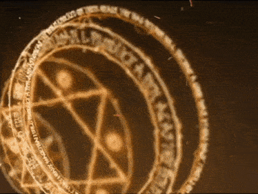 a close up of a circle with a pentagram in the center