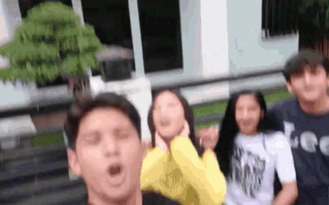 a group of people are posing for a picture and one of them is wearing a shirt that says lee