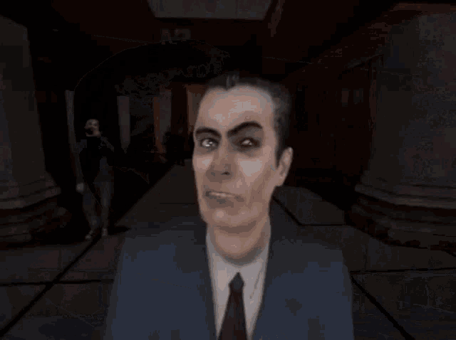 a man in a suit and tie is standing in a hallway with a sign that says ap on it