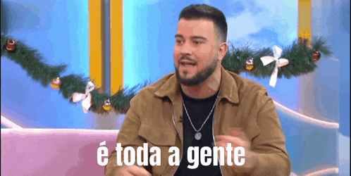 a man with a beard says " e toda a gente " in a foreign language