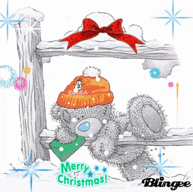 a teddy bear wearing a hat and holding an envelope with the words merry christmas below it