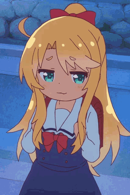 a little girl with blonde hair and a red bow on her head