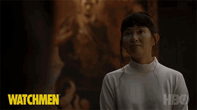 a woman says hi i 'm sample 2346 in front of a painting of a man