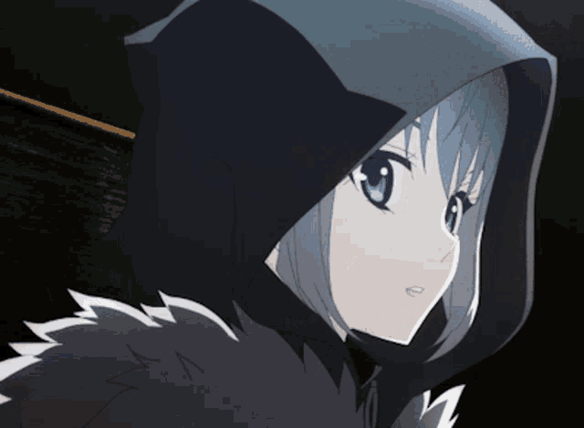 a girl with blue eyes is wearing a hooded jacket
