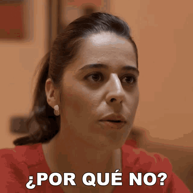 a woman in a red shirt says " por que no " in white letters