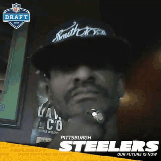 a man is wearing a hat and a watch and is a fan of the pittsburgh steelers .