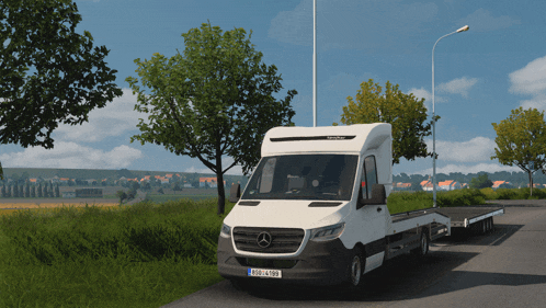 a white mercedes van has a trailer attached to the back of it