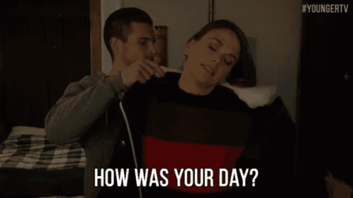a man and a woman are sitting next to each other and the man asks the woman how was your day