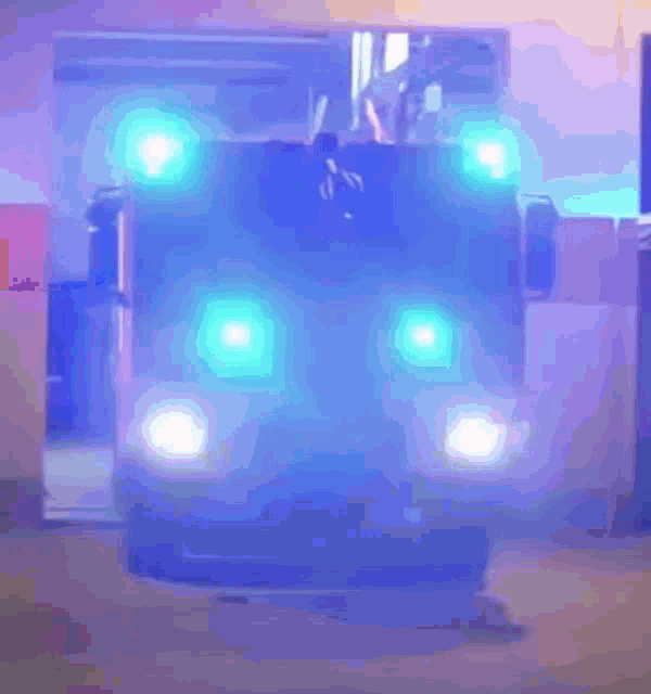 a purple and blue background with a blue car in the background