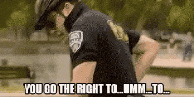 a police officer is talking on a cell phone and says `` you go the right to ... umm ... to ... ''
