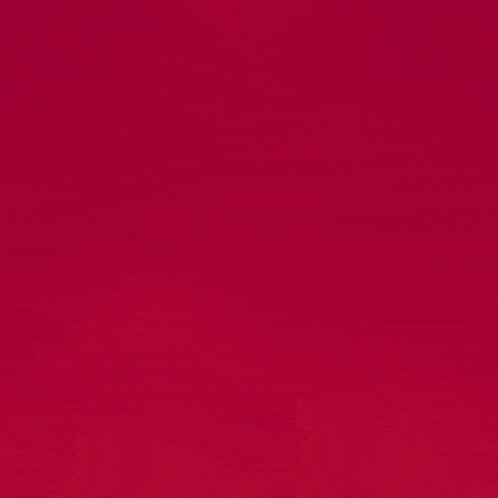 a soccer player wearing a sixt shirt stands in front of a red background
