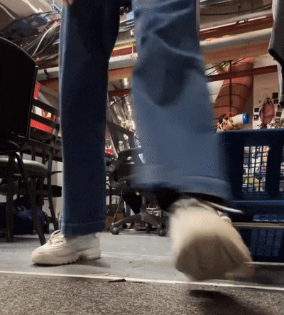 a person 's feet are shown in a blurry photo as they walk