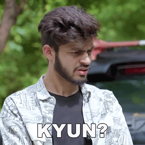 a man with a beard is making a funny face and the word kyun is on the bottom