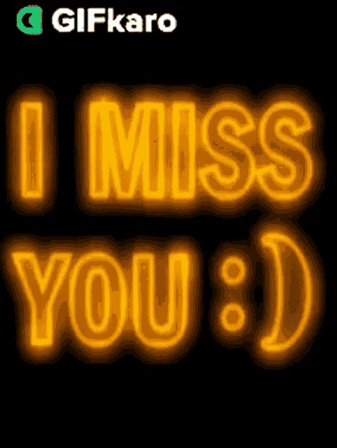 a neon sign that says ' i miss you ' on it