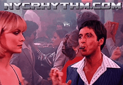 nycrhythm.com shows a man and a woman in a club