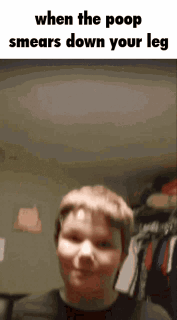 a boy is standing in front of a closet with the words when the poop smears down your leg