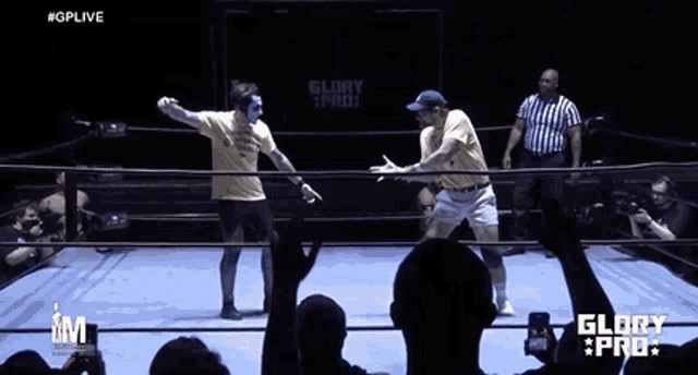 two men are wrestling in a ring with the word glory pro written on the bottom