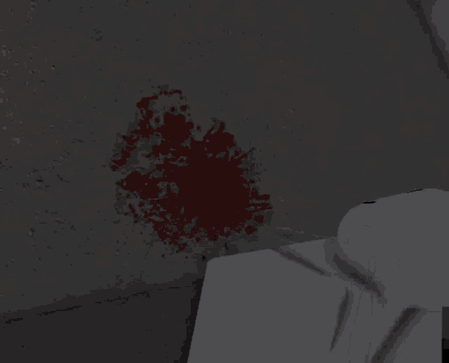 a white roblox character is standing in front of a wall with blood coming out of it .