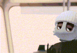 a cartoon character wearing a mask and a beanie is sitting in a bus .