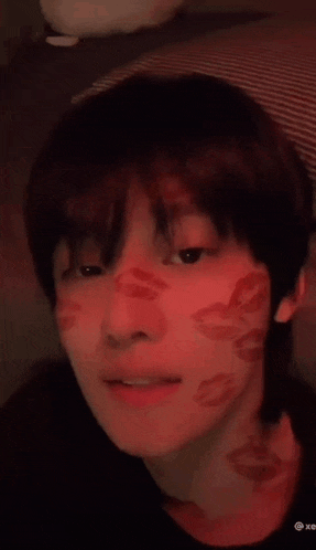 a person with red lips on their face