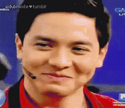 a close up of a man 's face with the words aldubmode tumblr visible