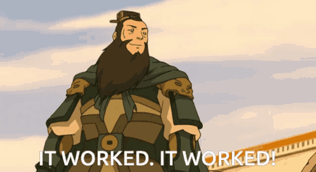 a man with a beard is standing in front of a sign that says " it worked it worked "