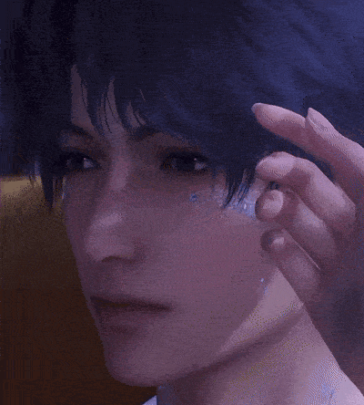 a close up of a person 's face with a hand touching it