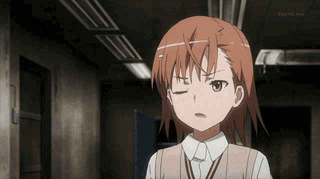 a tokyo mx logo can be seen in the corner of a picture of a girl
