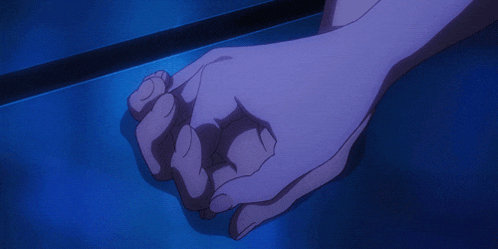 a close up of a person 's hand on a blue background