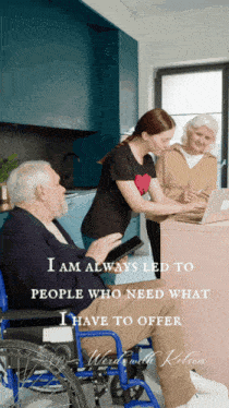 a man in a wheelchair is being helped by a woman in a kitchen