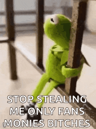 kermit the frog is sitting on a railing and holding onto a railing while holding a pole .