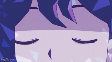 a close up of a person 's face with their eyes closed .