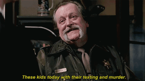 a man in a sheriff 's uniform is talking about these kids today with their texting and murder